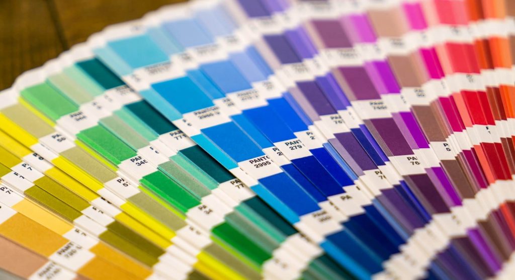 Image of a variety of vibrant Pantone colors arranged in a palette